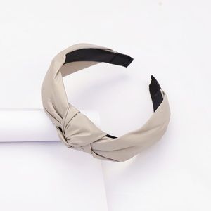 NWOT Faux Leather Knotted Headband in Beige